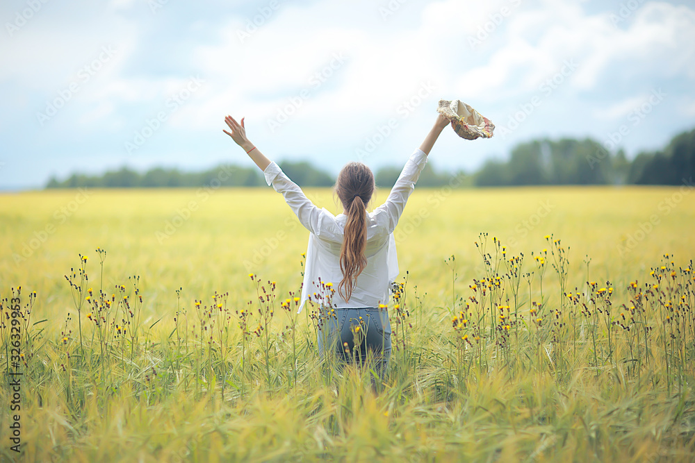 girl adult field hat happiness / european landscape girl in the field, straw hat, happy look girl adult field hat happiness / european landscape girl in the field, straw hat, happy look