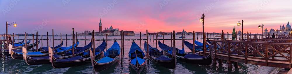 Church of San Giorgio Maggiore with gondolas at sunset time, Venice, Italy
