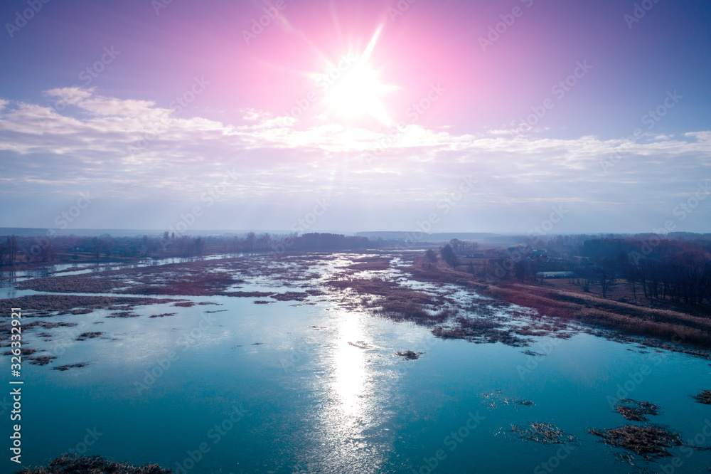 Aerial view of the lake in early spring. Nature landscape
