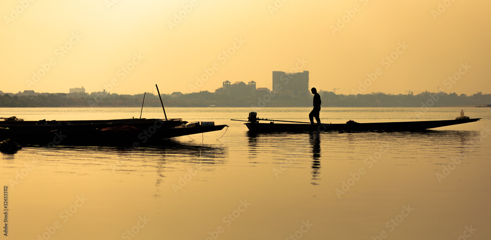 Sunrise and fishing along the Mekong in Vientiane 