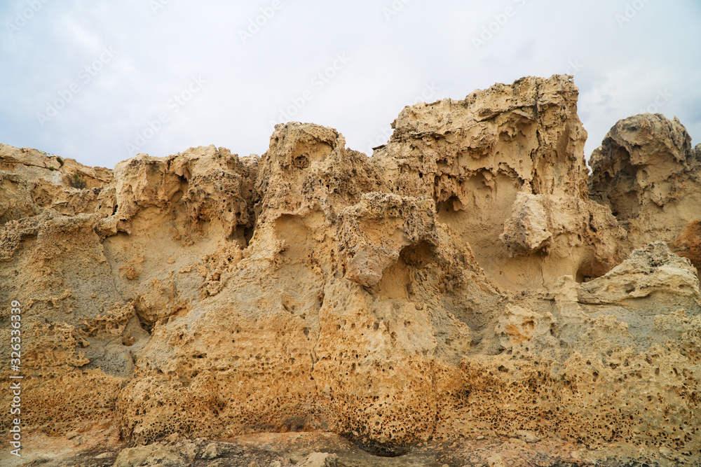 Fototapeta premium Beautiful lava stones on the Cyprus seashore.