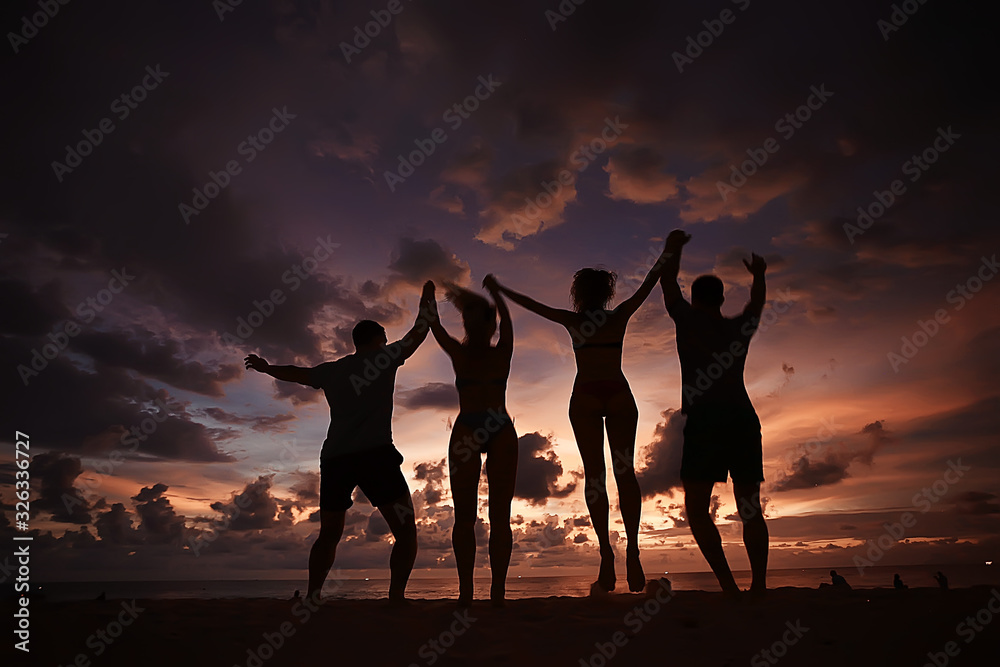 silhouette of friends sunset sea summer / group of young friends men and women in summer have a rest and have fun on the sea, happy sea sunset silhouette of friends sunset sea summer / group of young friends men and women in summer have a rest and have fun on the sea, happy sea sunset
