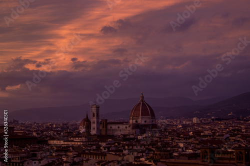 An intense red and purple sunset over florence