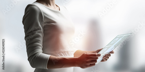 Businesswoman hands using virtual interface
