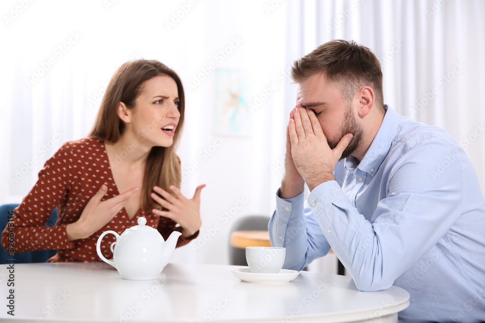 Couple having quarrel in cafe. Relationship problems Couple having quarrel in cafe. Relationship problems