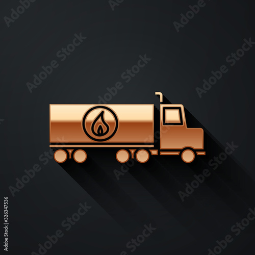 Gold Tanker truck icon isolated on black background. Petroleum tanker, petrol truck, cistern, oil trailer. Long shadow style. Vector Illustration