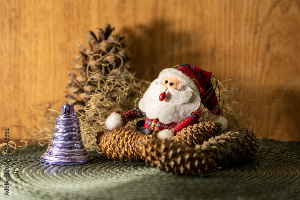 Obraz premium Christmas motifs featuring a Santa Claus surrounded by decorative ornaments for Christmas Day