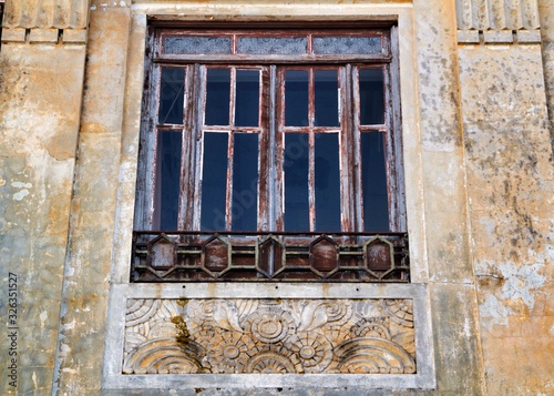 Old typical facade next to the water canal in Aveiro village in Porto