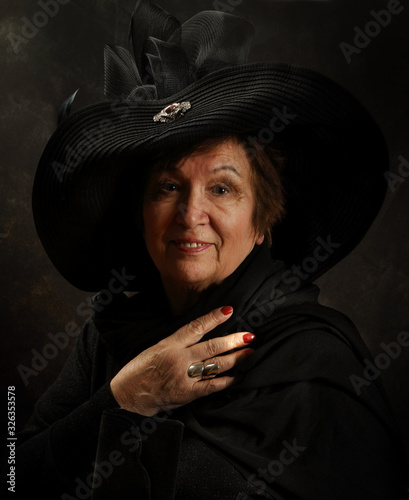 Photography Portrait of an elderly lady in the Victorian style in the studio