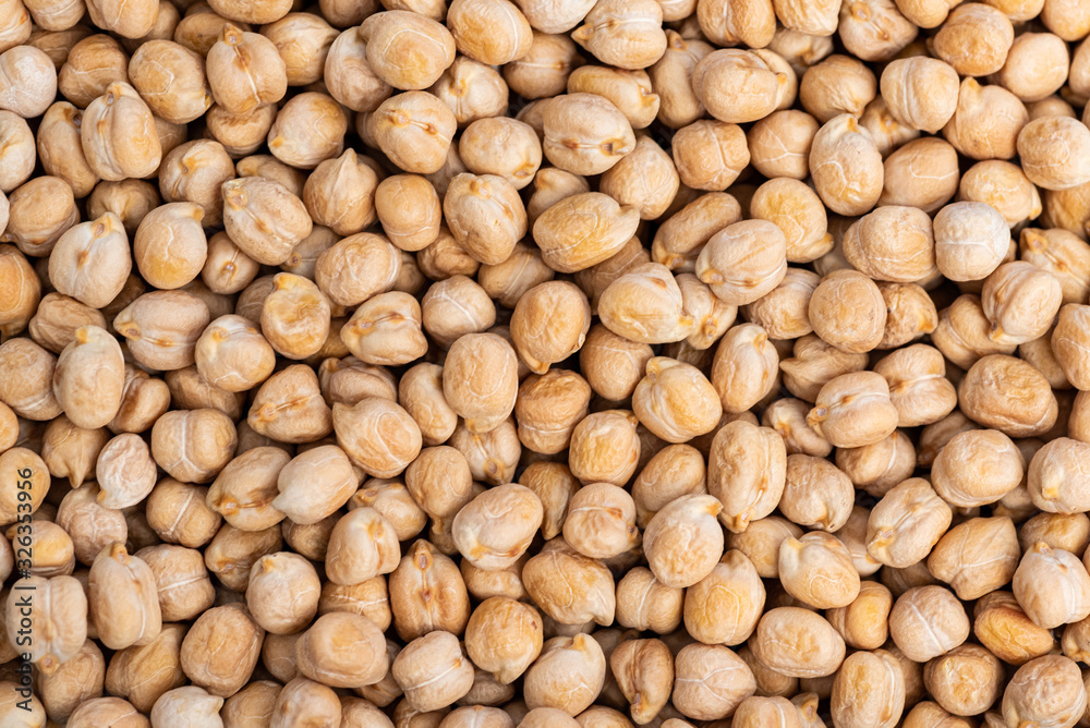Dried Chickpeas background, healthy food used in soups. Naturally preserved legumes with long shelf life. Dried Chickpeas background, healthy food used in soups. Naturally preserved legumes with long shelf life.