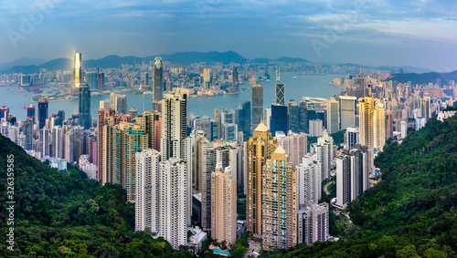Photography Aerial view of Victoria Harbour in Hong Kong.