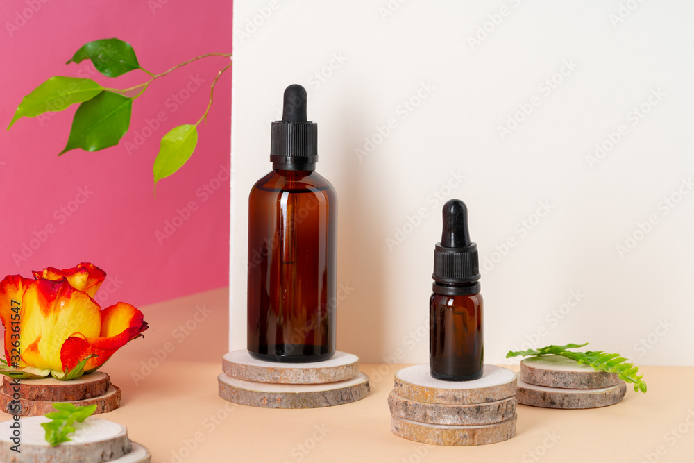 Brown glass cosmetic bottle. Organic cosmetic concept Brown glass cosmetic bottle. Organic cosmetic concept