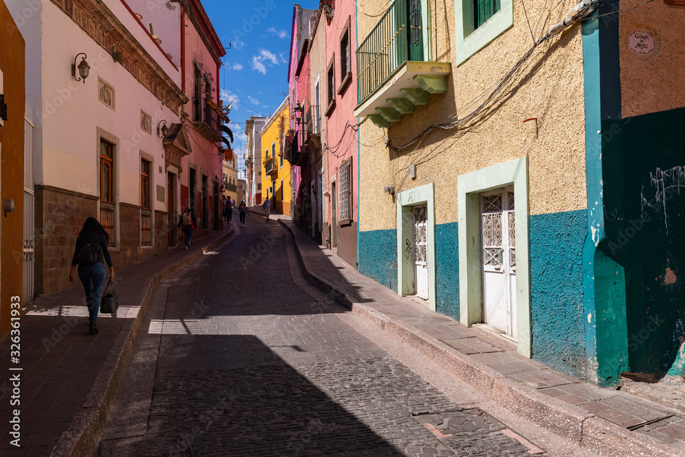 Colored colonial houses in old town of Guanajuato. Colorful alleys and narrow streets in Guanajuato city, Mexico. Spanish Colonial Style.