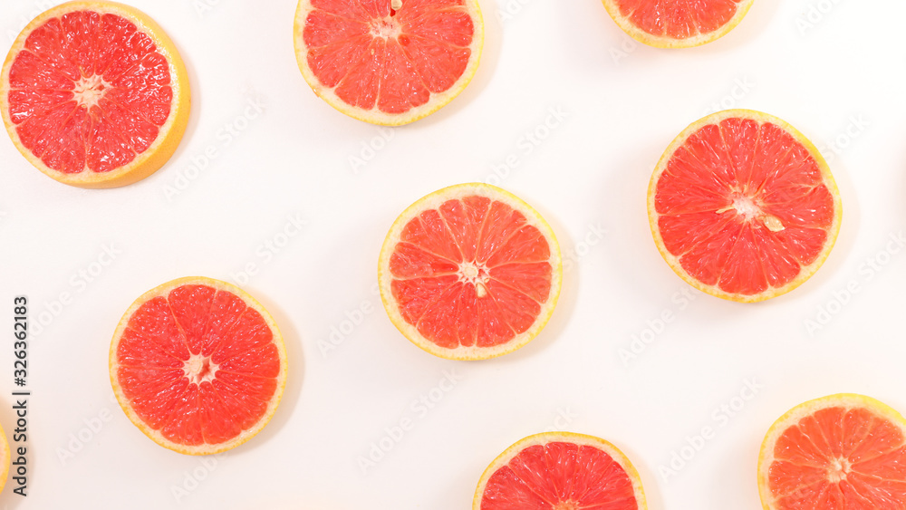 slices of red grapefruit, top view slices of red grapefruit, top view
