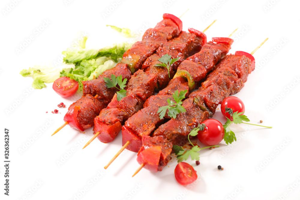 beef barbecue on stick with tomato isolated on white background
