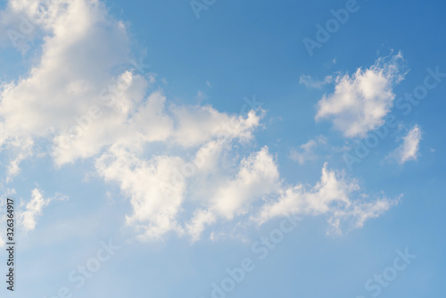 Blue sky with fluffy white cloud, Nature background	