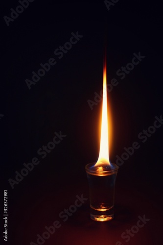 flame of candle on black background