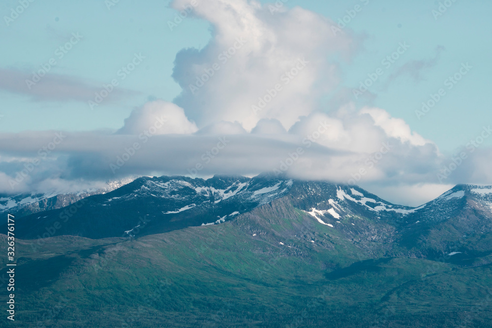 mountain scenery with dramatic clouds