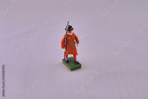 toy figure of beefeater close up photo