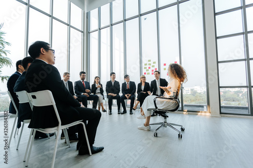 Group of business people sitting listen and present reviews in meeting room, leadership present, business teamwork partner concept.