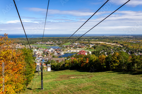 Aerial view of Blue Mountain resort and village from the Open Air Gondola during the autumn in Collingwood, Ontario