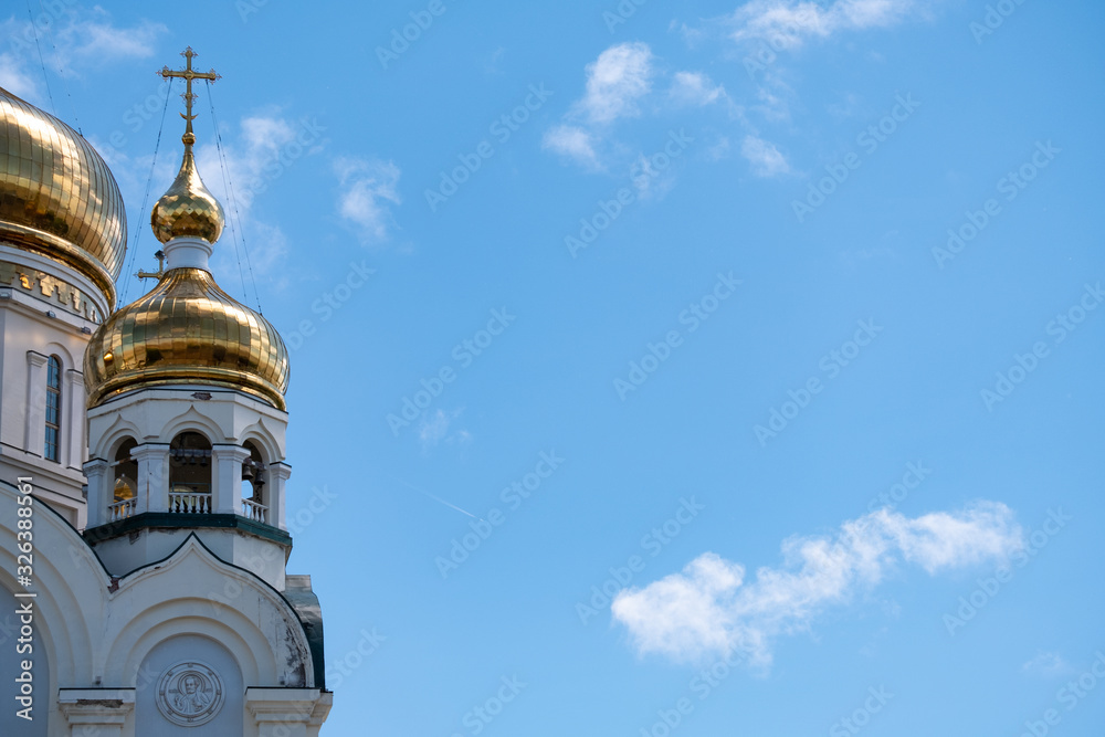 Khabarovsk, Russia - Jun 15, 2019: Spaso-Preobrazhensky Cathedral in Khabarovsk on the background of blue cloudy sky. Khabarovsk, Russia - Jun 15, 2019: Spaso-Preobrazhensky Cathedral in Khabarovsk on the background of blue cloudy sky.