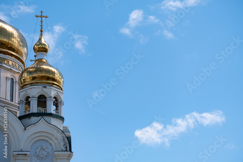 Khabarovsk, Russia - Jun 15, 2019: Spaso-Preobrazhensky Cathedral in Khabarovsk on the background of blue cloudy sky.