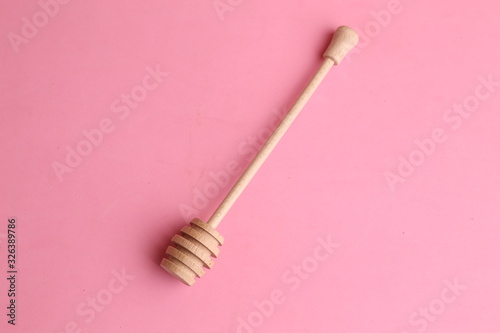 honey stick in color background