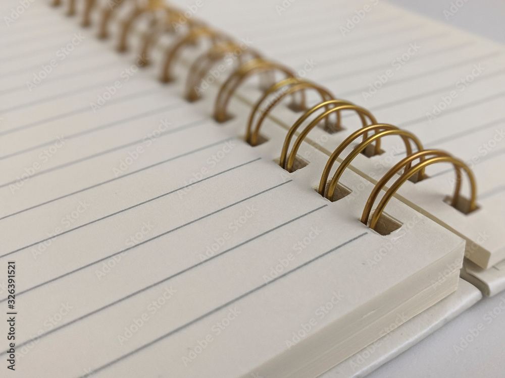 Durable Golden Binding Spine on a Notebook Durable Golden Binding Spine on a Notebook