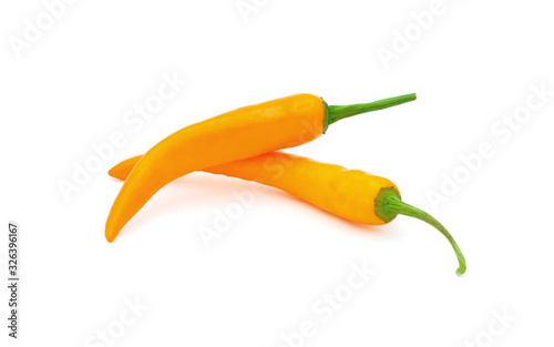Fresh orange chili pepper isolated on a white background. Chili hot pepper with clipping path