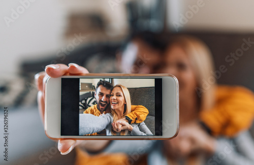 Young couple at home,take selfie