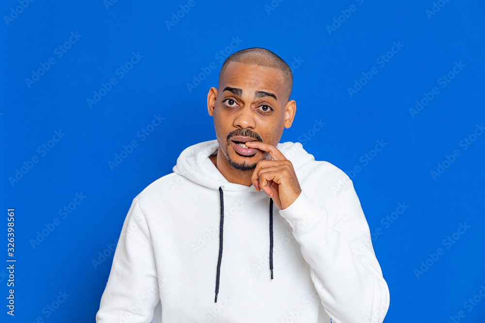 African guy wearing a white sweatshirt