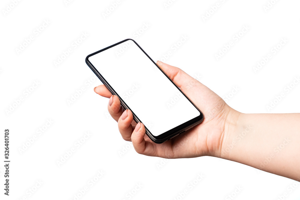 Woman hand holding and showing blank smart phone isolated on white background with clipping path around and display with copy space for your text Woman hand holding and showing blank smart phone isolated on white background with clipping path around and display with copy space for your text
