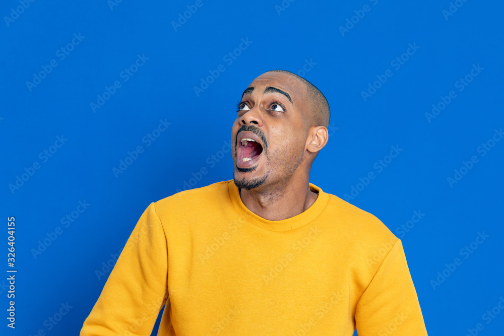 African guy with a yellow jersey African guy with a yellow jersey