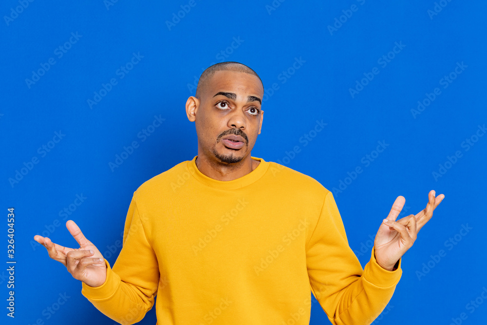 African guy with a yellow jersey African guy with a yellow jersey