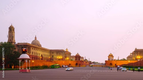 Delhi, India. Illuminated Rashtrapati Bhavan an Parliament building in Delhi, India. Time-lapse of car traffic trail lights. Zoom in photo