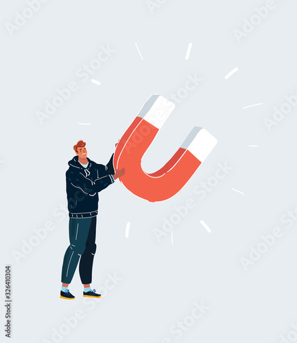 Man with big giant magnet in his hands.