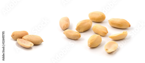 group of peeled peanuts  isolated on white background photo