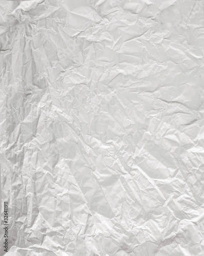 white sheet of paper battered with texture