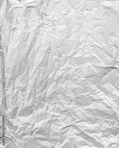 white sheet of paper battered with texture