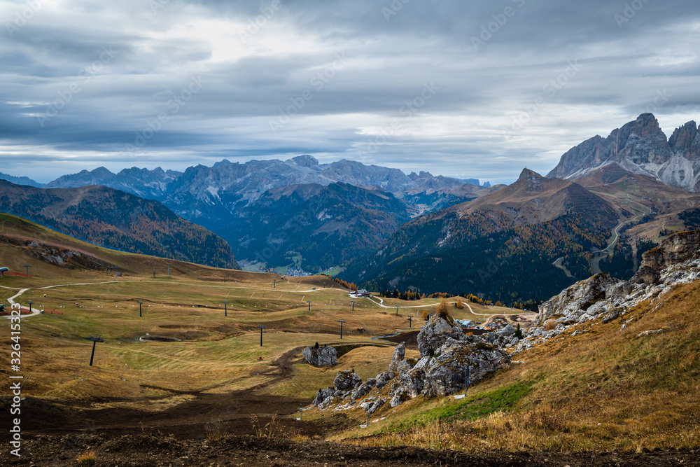 Autumn alpine Dolomites mountain scene near Pordoi Pass, Trentino , Italy. Autumn alpine Dolomites mountain scene near Pordoi Pass, Trentino , Italy.