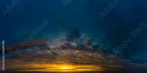 Fantastic dark thunderclouds at sunrise © StepStock