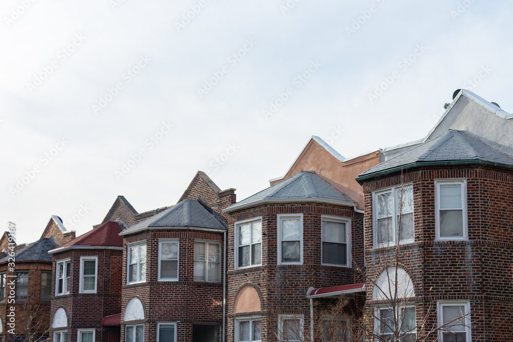 Row of Similar Old Brick Homes in Astoria Queens New York Row of Similar Old Brick Homes in Astoria Queens New York