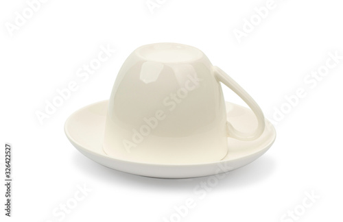Coffee cup upside down on saucer isolated on white background  with clipping path.