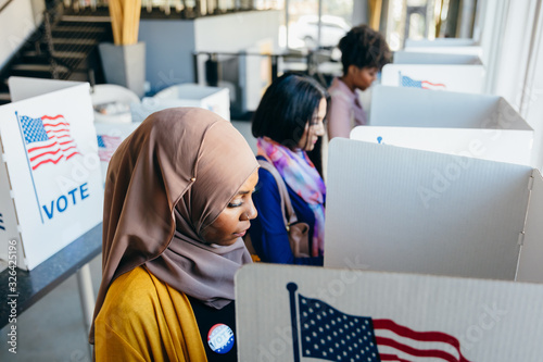 Diverse Women Voting on Election Day