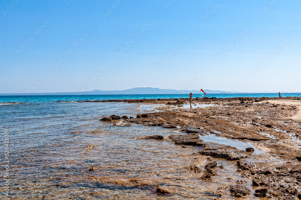 Afytos, Greece - September 02, 2019: Panoramic view of beach of town of Afytos, Kassandra, Chalkidiki, Central Macedonia, Greece Afytos, Greece - September 02, 2019: Panoramic view of beach of town of Afytos, Kassandra, Chalkidiki, Central Macedonia, Greece
