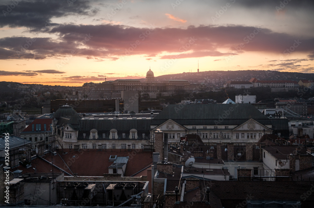 sunset over the roofs of Budapest during winter