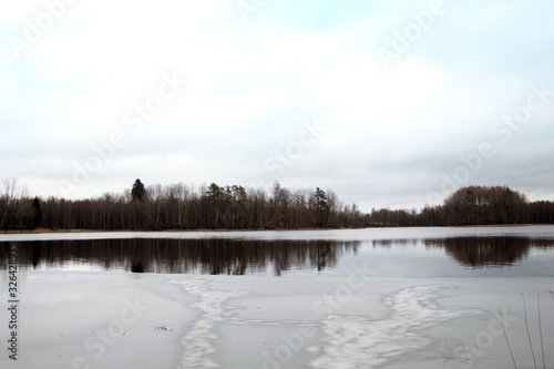  Forest Lake begins to become covered with ice.