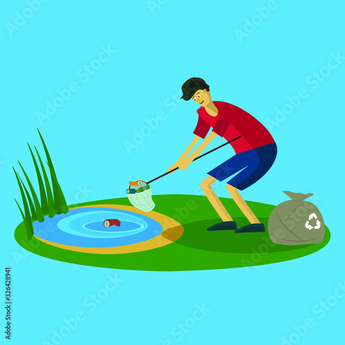 young guy cleans debris with water