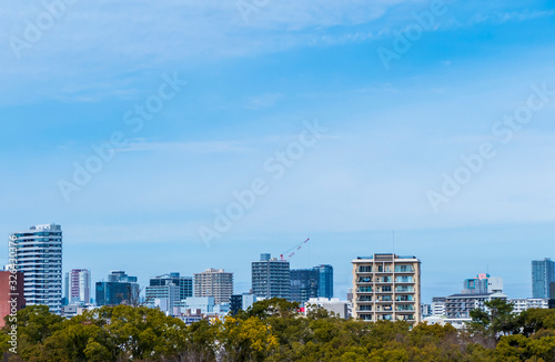 Osaka, Japan cityscape with blue sky at sunny day, copy space. beautiful of urban landscape, skyline city office buildings, on Sky clouds background. Buildings, town ,city Asia concept